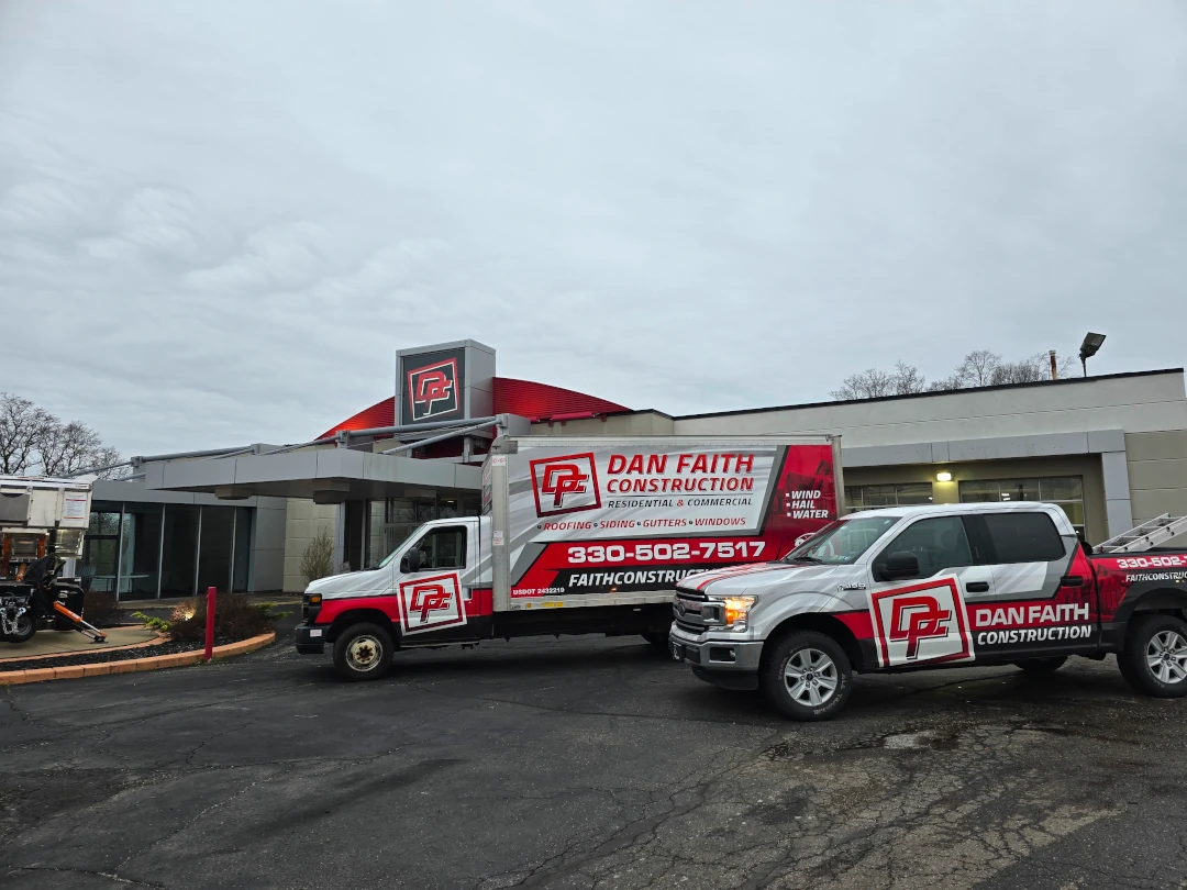 dan faith roofing building with trucks